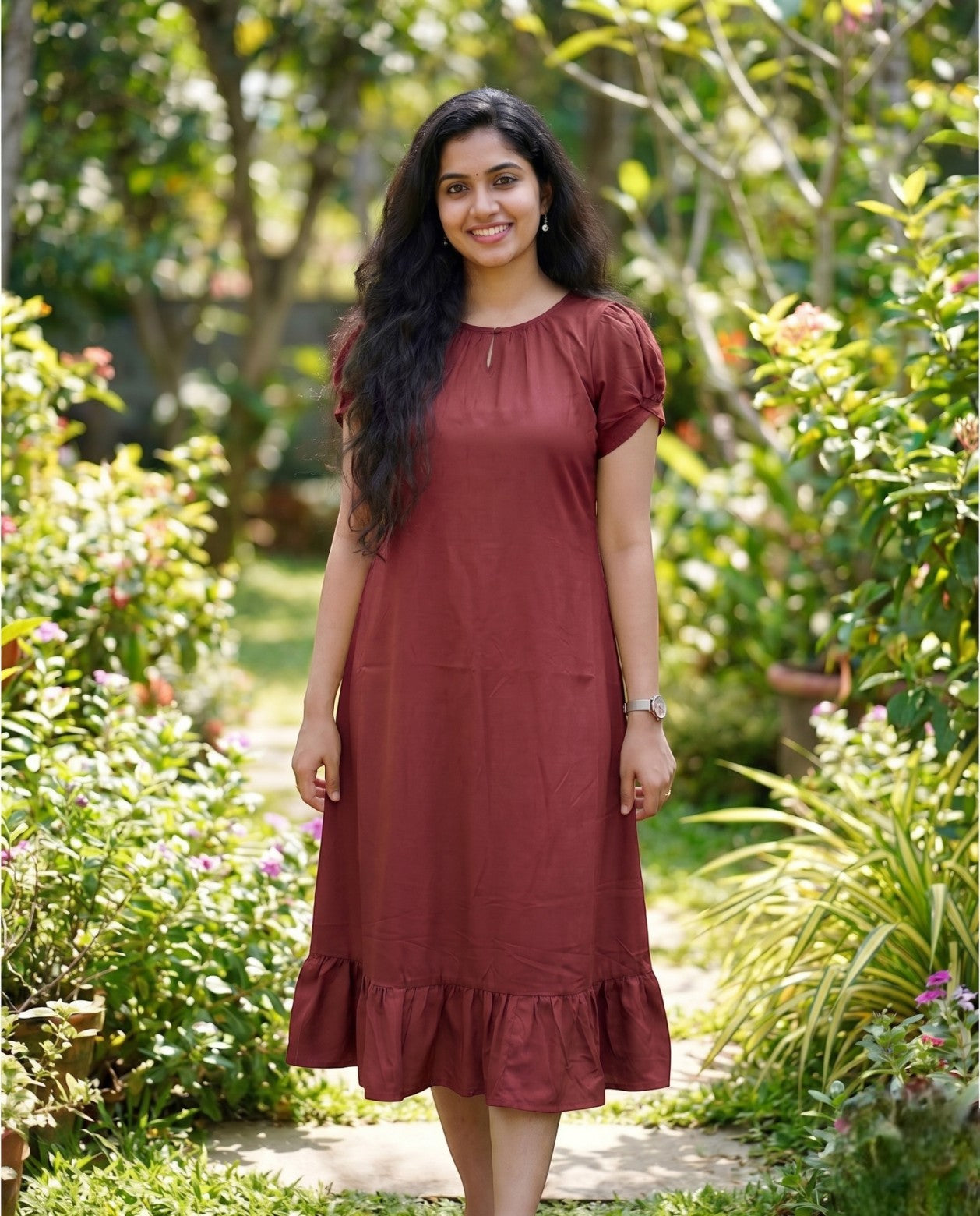 Puff sleeved frock with special neckline and tie back