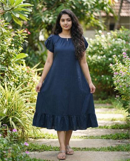 Puff sleeved frock with special neckline and tie back